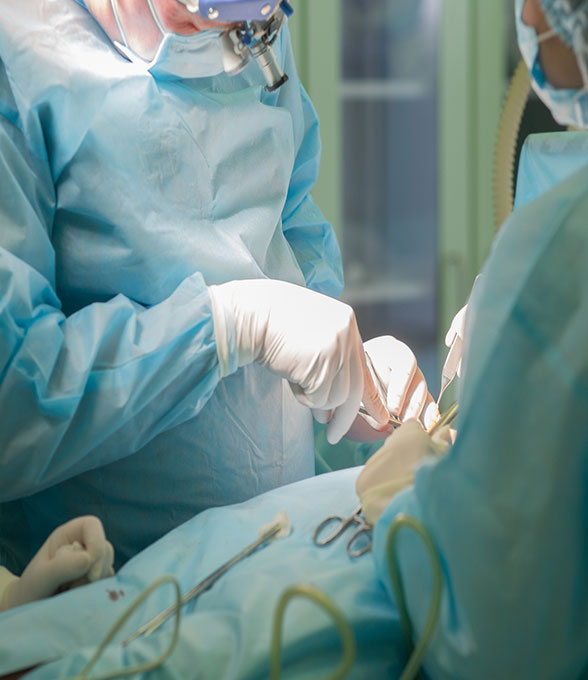 Surgical team using instruments during an operation