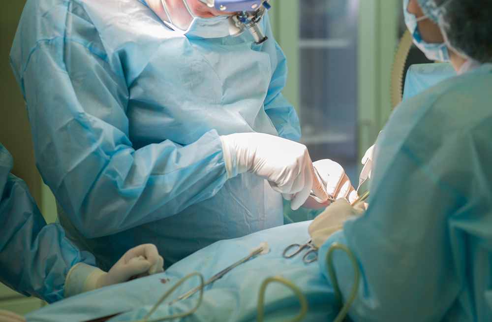 Surgeon at work. Surgery in hospital operating room Gynecomastia (Male Breast Reduction) in Bucks County, PA & Hunterdon County, NJ