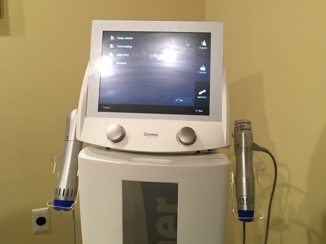 Zimmer-brand treatment device with dual handpieces on a touchscreen console